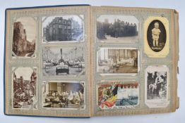 Edwardian postcard album of approximately 240 cards including military, humorous, topographical,