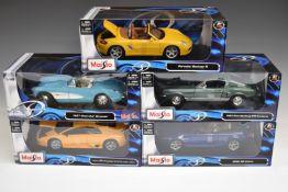 Five Maisto 1:18 scale diecast model cars including Porsche Boxster S, BMW M6 Cabrio and 1957