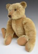 German Teddy bear probably Bing with blonde mohair, black boot button eyes, straw filling, disc