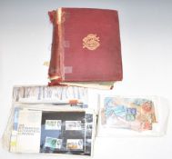 The Strand stamp album containing a world stamp collection along with GB first day covers and