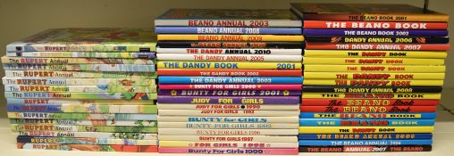 Over Fifty children's annuals including The Beano, Dandy and Rupert The Bear.