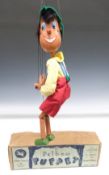 Pelham Puppets SS Tyrolean Boy puppet with wooden body, metal joints, red dungarees, yellow shirt