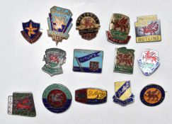 A collection of Butlins holiday camp badges for Pwllheli and Barry Island from 1948 to 1967