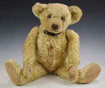 Farnell Teddy bear with blonde mohair, shaved snout, part straw filling, disc joints, cloth pads and