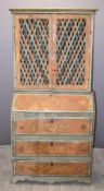 Continental bureau bookcase, having lattice work doors to the top, fall flap opening to reveal small