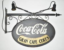 Coca Cola double sided advertising sign on wall bracket, 80 x 93cm