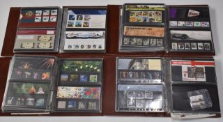 Approximately 200 Royal Mail mint presentation packs in four albums, high face value