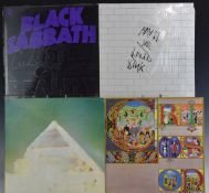 A collection of approximately 40 albums including Pink Floyd, Black Sabbath, King Crimson, The