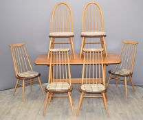 Ercol light elm dining table L152 x W84 x H73cm and six chairs, four hoop back and two bar back