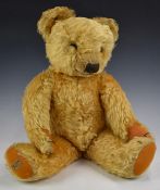 Merrythought Teddy bear with squeaker, golden mohair, soft filling, disc joints, felt pads, stitched