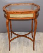 19th/20thC inlaid satin wood bijouterie table raised on cabriole legs united by a shaped X in the