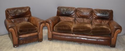 Upholstered leather sofa and matching chair, length of sofa 188cm