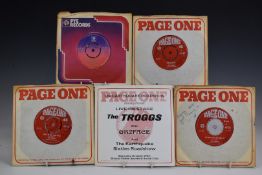 The Troggs - A collection of 22 singles some signed by band members including Reg Presley