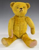 American Teddy bear with golden mohair, straw filling, disc joints, felt pads and stitched features,
