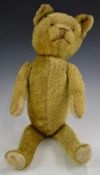 American Teddy bear with blonde mohair, straw filling, disc joints, felt pads and stitched features,
