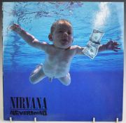 Nirvana - Nevermind (GEF 24425) upside down text/monkey on inner. Record, cover and inner at least