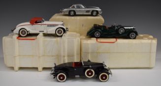 Four Franklin Mint diecast model vehicles comprising 1935 Auburn Boat Tail Speedster, 1938 Alvis 4.3
