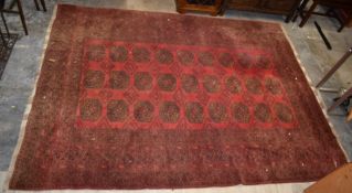 Wool rug with red ground, 217 x 288cm