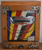 Bryans Elevenses penny slot arcade machine with wooden case and chrome fittings, 55x41cm.