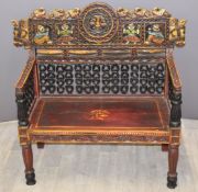 A continental carved wood bench with figural and horse head decoration, W108 x D50 x H100cm