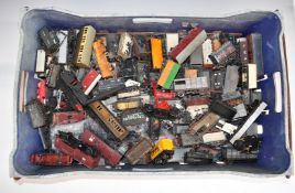 A large collection of Hornby Dublo, Tri-ang and similar 00 gauge model railway goods wagons, vans,