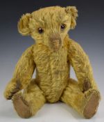 Farnell or similar Teddy bear with blonde mohair, straw filling, disc joints, cloth pads and
