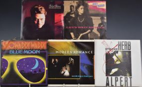 Approximately 300 singles from the 1960s to 1980s plus singles without covers