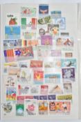 A mint and used world stamp collection in albums, on stock pages, album pages etc including Germany,