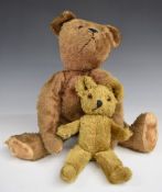 Two American Teddy Bears one in the form of a pyjama case with brown mohair, straw filled limbs,