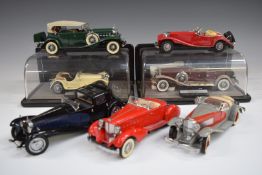 Seven Franklin Mint diecast model vehicles including 1930 Bugatti Royale Coupé Napoleon, 1930