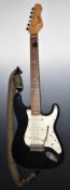 Encore Stratocaster style electric guitar with strap and stand, and Harley Benton guitar amp