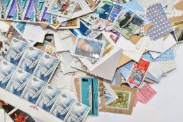 Large collection of mainly used and mint GB, Queen Elizabeth II stamps in multiple albums. A few