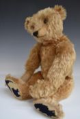 Steiff Teddy bear with blonde mohair, straw filling, disc joints, stitched features and button to