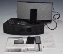 Bose Wave radio and CD player and a Bose iPod docking system with iPod