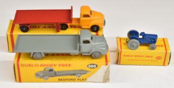 Three Dublo Dinky Toys diecast model vehicles Bedford Flat Truck 066, Massey-Harris-Ferguson Tractor