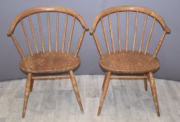Six Ercol light elm dining chairs including two armchairs
