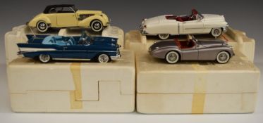 Four Franklin Mint diecast model vehicles comprising 1949 Jaguar XK 120, 1957 Chevrolet Bel Air,