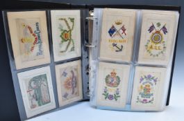 Postcard album containing approximately 135 WW1 and WW2 silk cards including Royal Flying Corps,