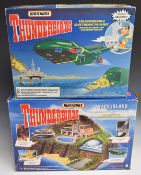 Two Matchbox Thunderbirds play sets Tracy Island and Thunderbird 2, both in original boxes.