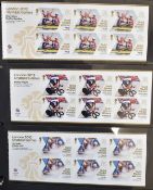 A collection of GB smiler sheets in two folders along with the London 2012 Olympics and