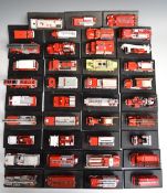 Forty Del Prado diecast fire engines and emergency vehicles, all on display stands.