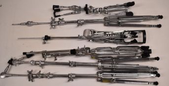 Six stands comprising three Yamaha cymbal stands, one snare drum stand, one Hi-Hat stand and a Pearl