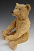 Steiff Teddy bear with blonde mohair, straw filling, disc joints, stitched features and button to