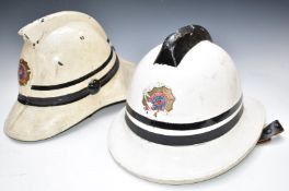 Two vintage Tyne & Wear fire helmets, one post war metropolitan style, the other Cromwell dated