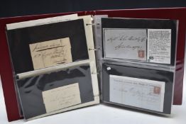 A folder of GB postal history from pre stamp covers to King George V including 1d black on cover,