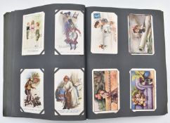 Approximately 312 postcards contained in an Edwardian album with LM monogram to cover including