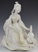 Continental blanc de Chine porcelain figurine of a female violinist, possibly Berlin, height 34cm