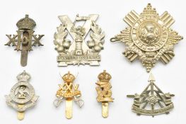 Seven British Army badges including Royal Bucks Hussars (Firmin London to slider), 20th Hussars