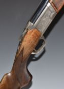 Browning Cynergy 12 bore over and under ejector shotgun with engraved scenes of birds to the