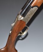 Browning Medalist Sporter 12 bore over and under ejector shotgun with scrolling engraving to the